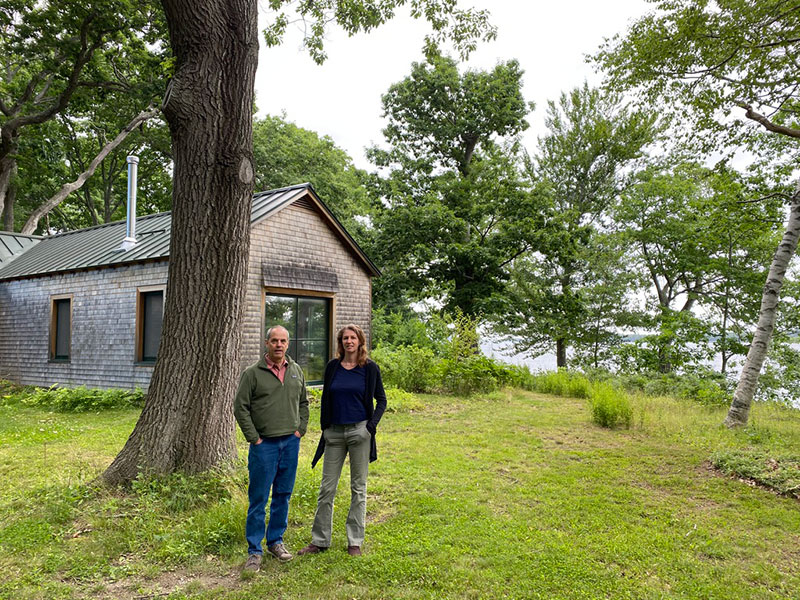Lillian Harris and her husband Daniel Hildreth at their rewilded home in coastal Maine. 
